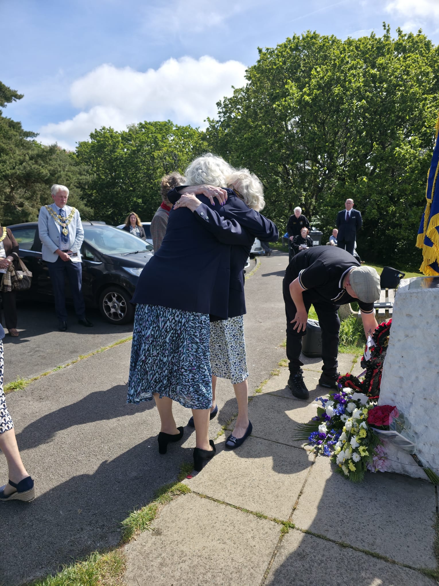 Veterans memorial service with wreaths, Poole