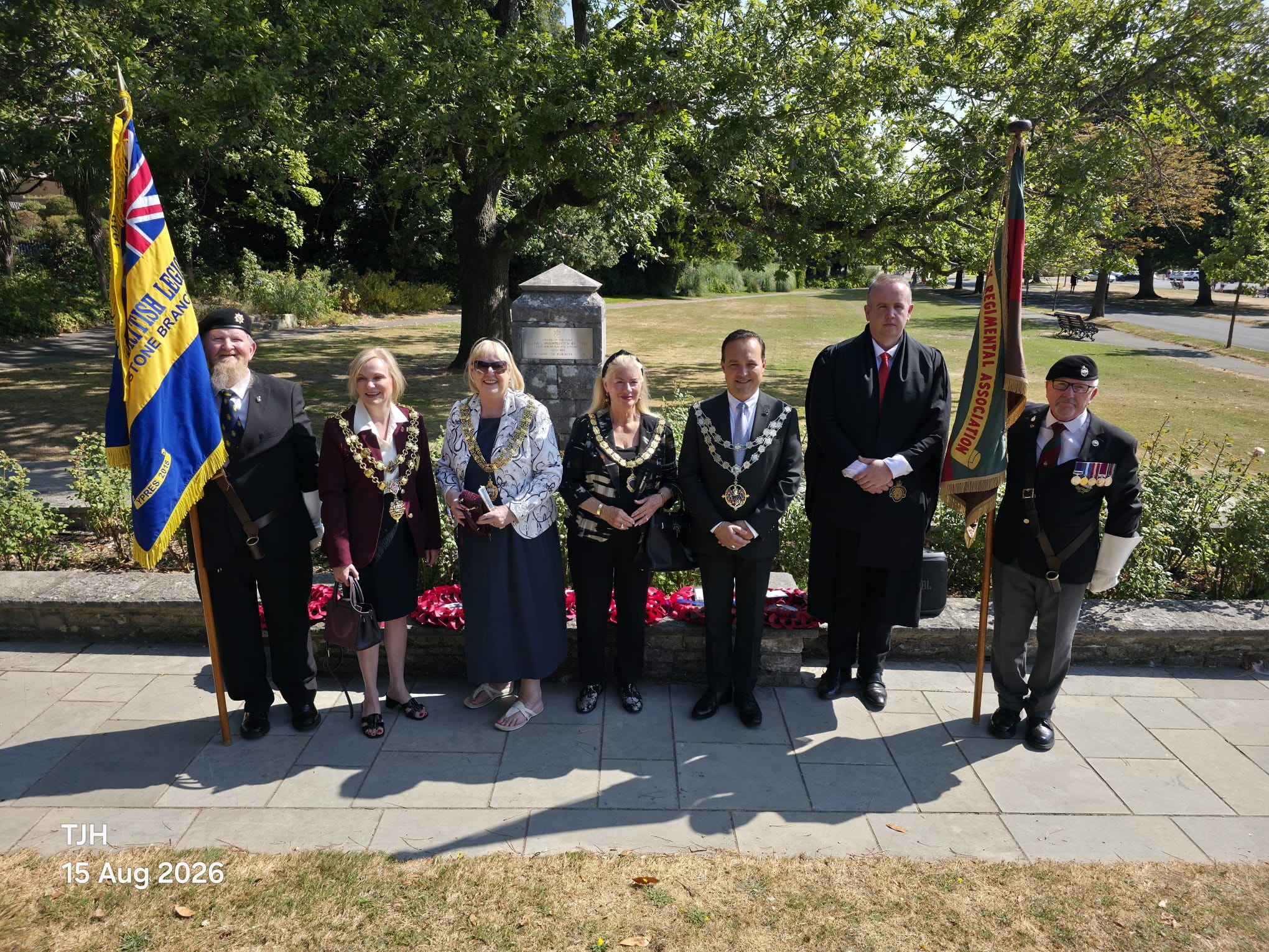 VJ Day ceremony with dignitaries and standard bearers, Poole Park